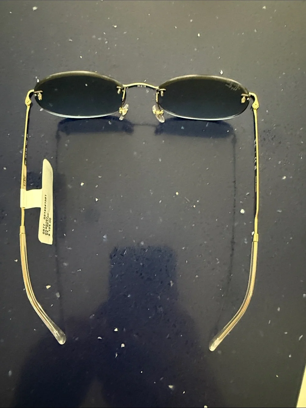 Ray-Ban Men’s Gold Frame Blue Lens Rimless Sunglasses - Oval